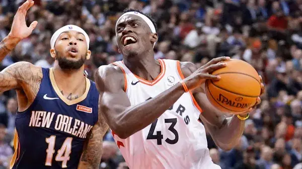 Siakam Shines; Champs Win in Overtime