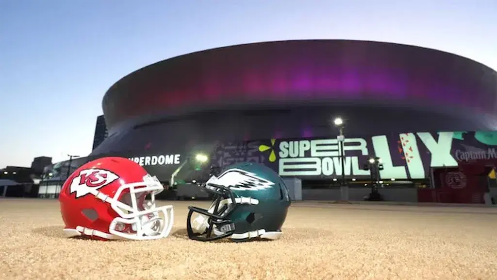 Helmets of the Kansas City Chiefs and Philadelphia Eagles outside Caesars Superdome, site of the Super Bowl 59 matchup between the two teams