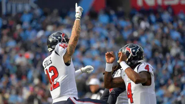 Texans Trip Up Titans In Round 1 For AFC South Title