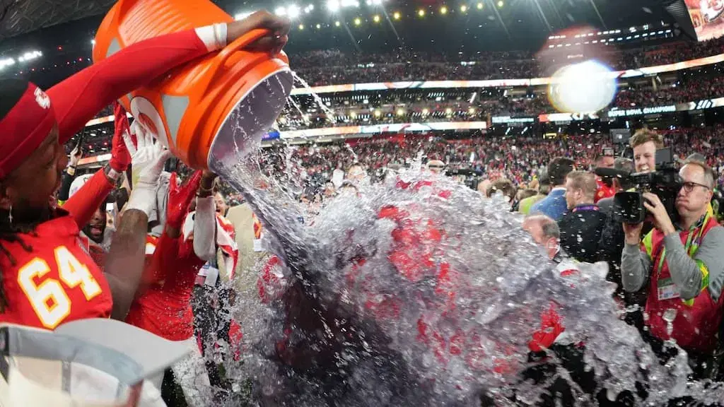 Kansas City Chiefs head coach Andy Reid is showered in purple Gatorade after Super Bowl 58