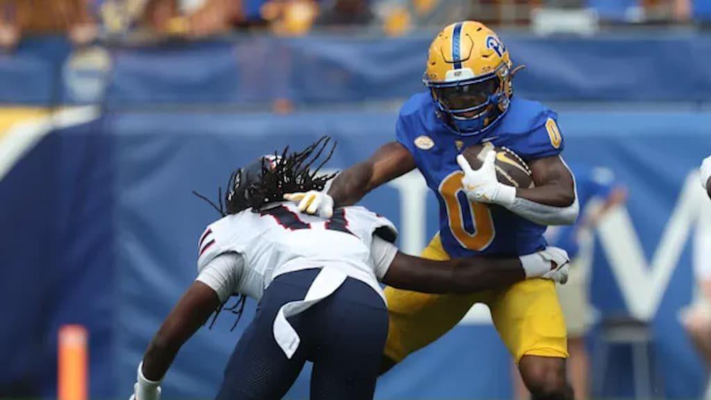 Pittsburgh Panthers running back Desmond Reid (#0) in action during a game - Louisville vs. Pittsburgh Football Prediction & Best Bets (9/27/2025)