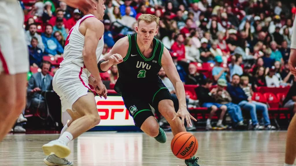 Utah Valley leading scorer Jackson Holcombe - Cal Baptist vs. Utah Valley Prediction & Best Bets (2026 WAC Tournament Final - Saturday, March 14, 2026) cover