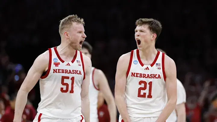 Nebraska basketball stars Rienk Mast (left, #51) and Pryce Sandfort (right, #21) - #5 Vanderbilt vs. #4 Nebraska Prediction & Expert Picks (2026 Men's March Madness South Region Second Round) cover