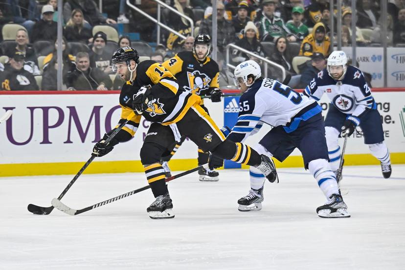 Bryan Rust and Mark Scheifele