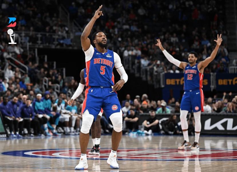 Malik Beasley celebrates hitting another 3. 