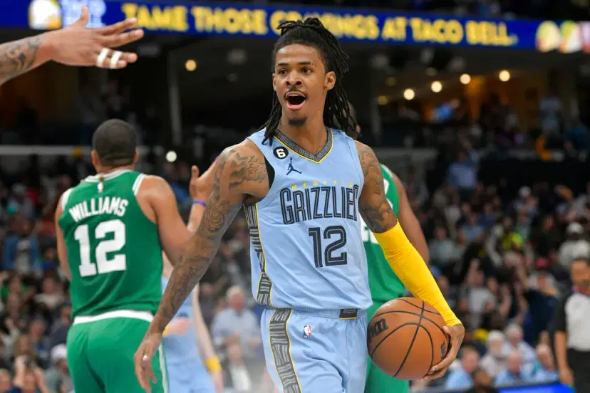 Ja Morant exclaiming powder blue Memphis Grizzlies jersey.