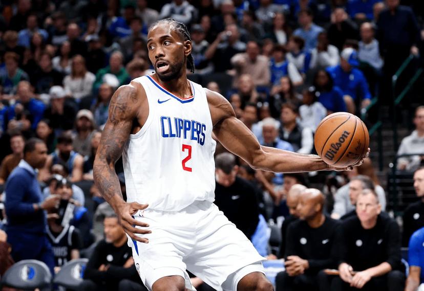 Kawhi Leonard looks for the open man.