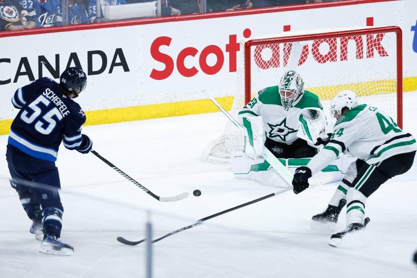 Mark Scheifele and Jake Oettinger battle