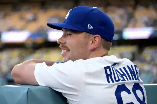 Dalton Rushing in the dugout
