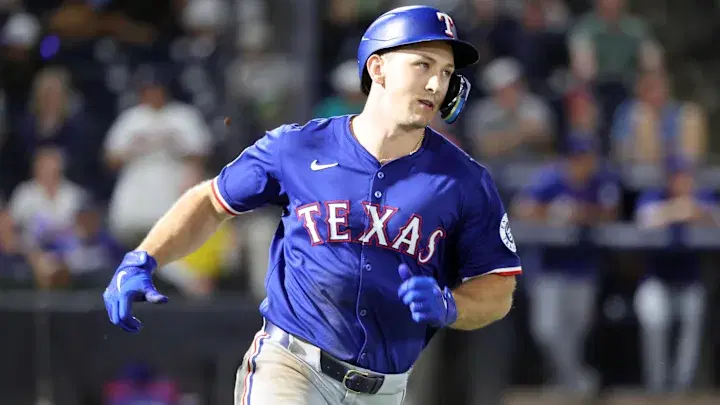 Wyatt Langford running around bases