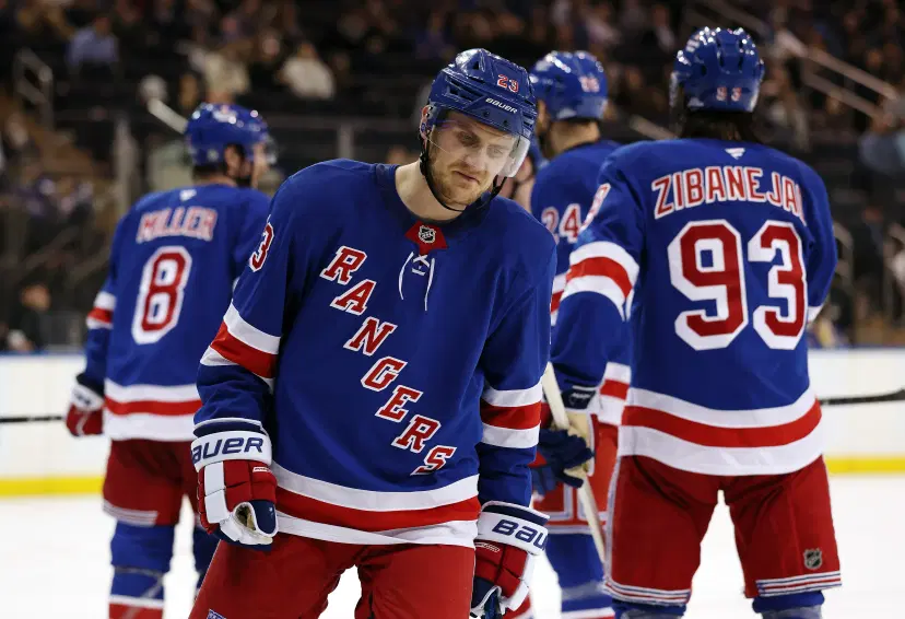 Adam Fox and Rangers players
