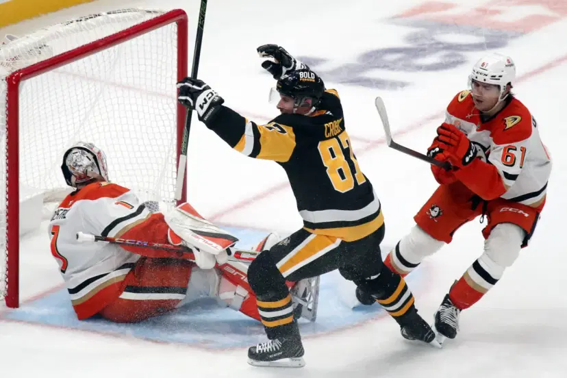 Sidney Crosby and Lukas Dostal