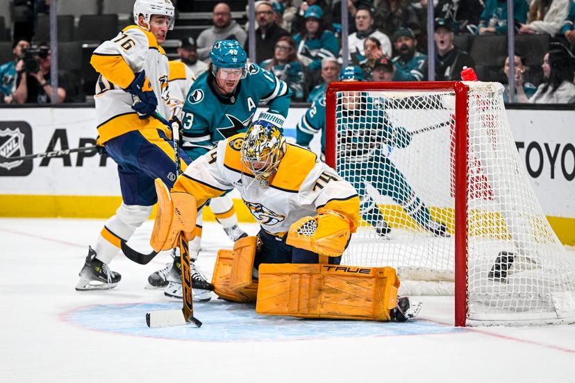Tyler Toffoli and Juuse Saros